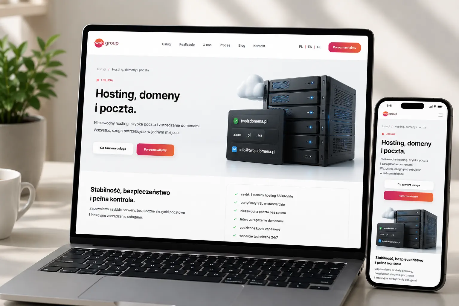 WOH GROUP hosting, domains, and email displayed on a laptop in a bright, modern interior